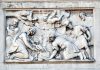 L’Adorazione dei pastori, bassorilievo sulla facciata della Chiesa di San Giuseppe di Castello