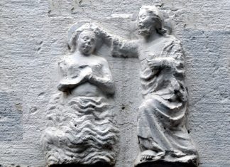 Il Battesimo di Gesù, bassorilievo in Ramo de la Madonna, nel Sestiere di Dorsoduro